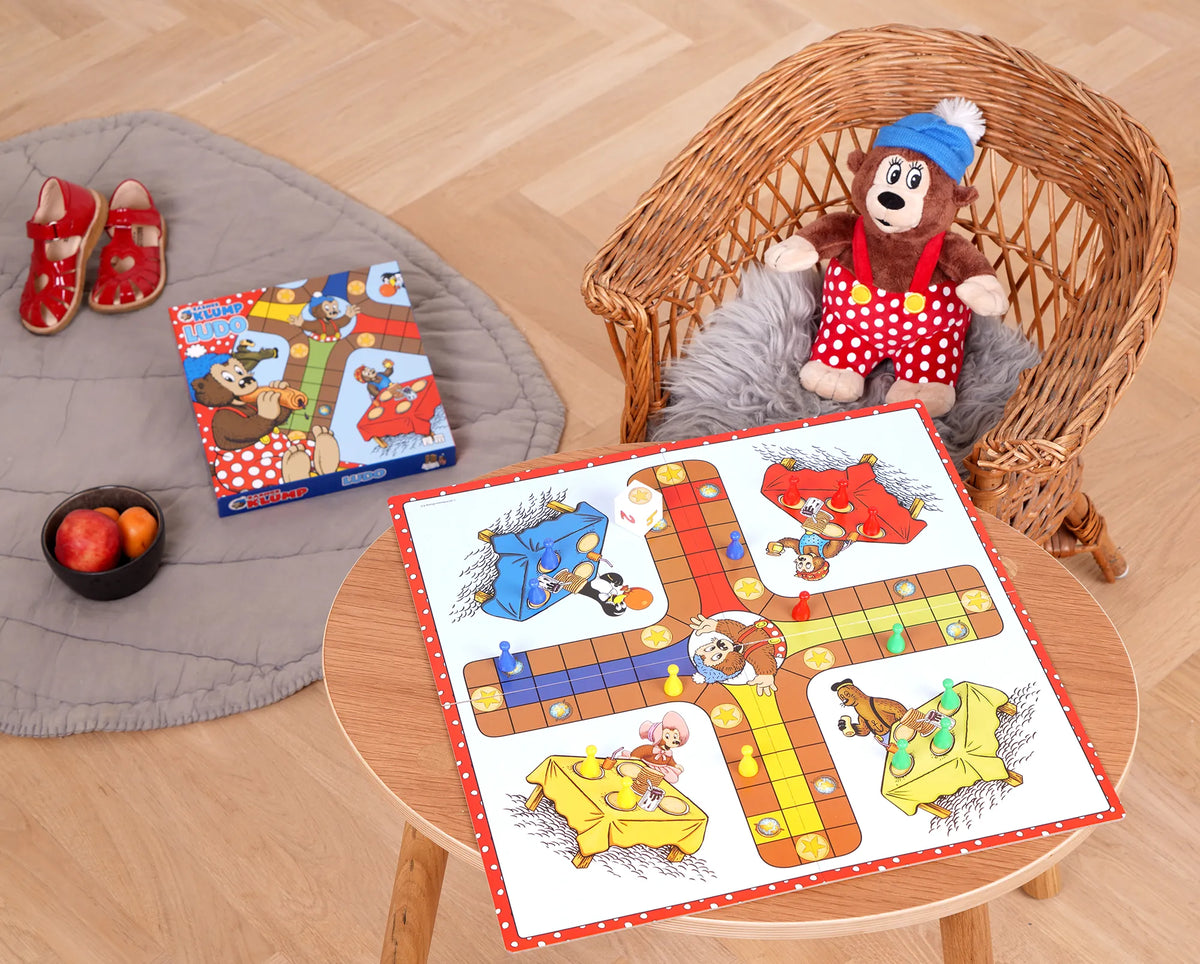 Rasmus Klump Ludo brætspil til børn og familier med spilleplade, farvede brikker og klassiske figurer fra Rasmus Klump-universet.
